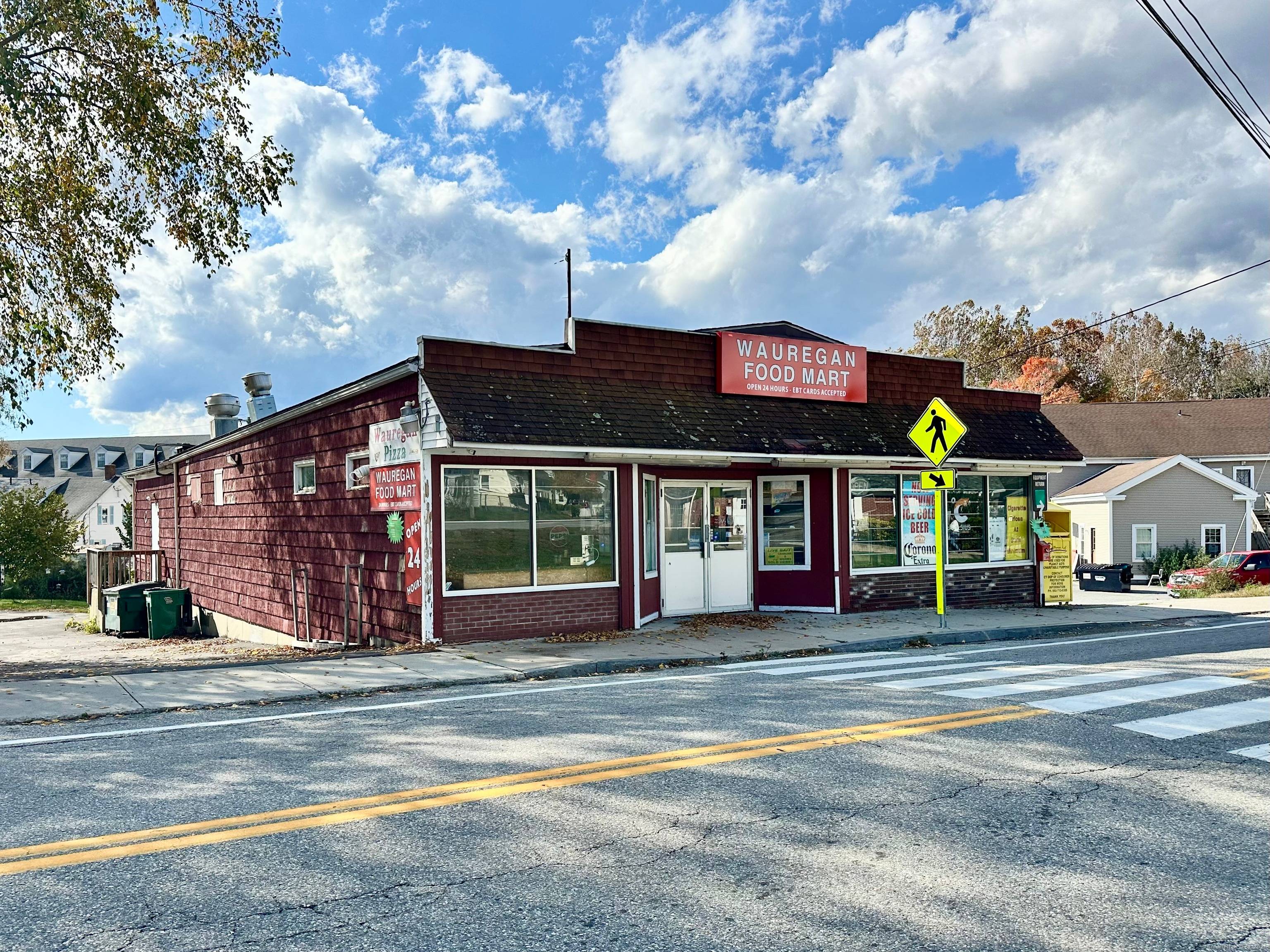 Commercial building for sale with one to two storefront units, approx 1, 425sq' each and easily combined to 2, 850sq'.