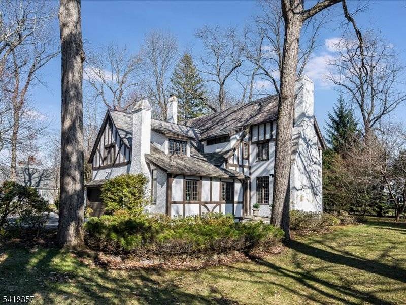 Old world craftsmanship and modern updates are a winning combination in this enchanting storybook Tudor.