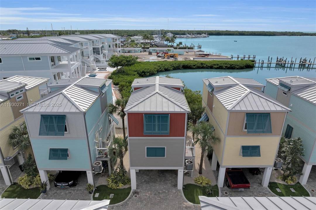 The Keys are calling ! Welcome to this beautifully appointed 2 bedroom, 1.