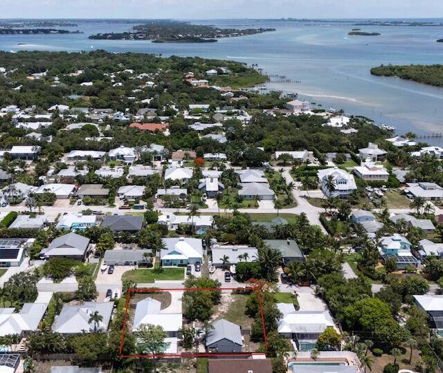 Welcome to a unique investment opportunity to own a double lot in the Rocky Point community of Stuart.