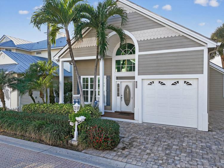 Tucked within the intimate, gated seaside enclave of Jupiter Key, just steps from the Atlantic shoreline, this Key West style residence offers a rare opportunity to own within one of ...