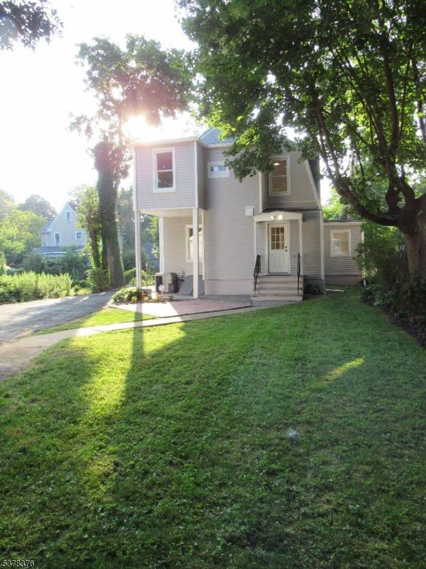 2 Story Colonial that features 3 4 Bedrooms, 2 1 2 Baths on a partially fence yard with detached oversized 2 car garage for your private use.