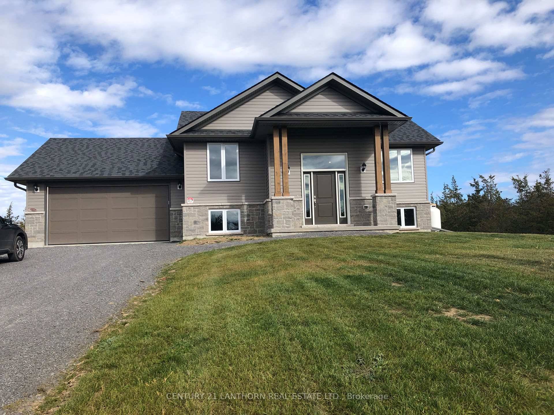 Newly built this raised sunlight filled bungalow has country views and is ready for your furniture !