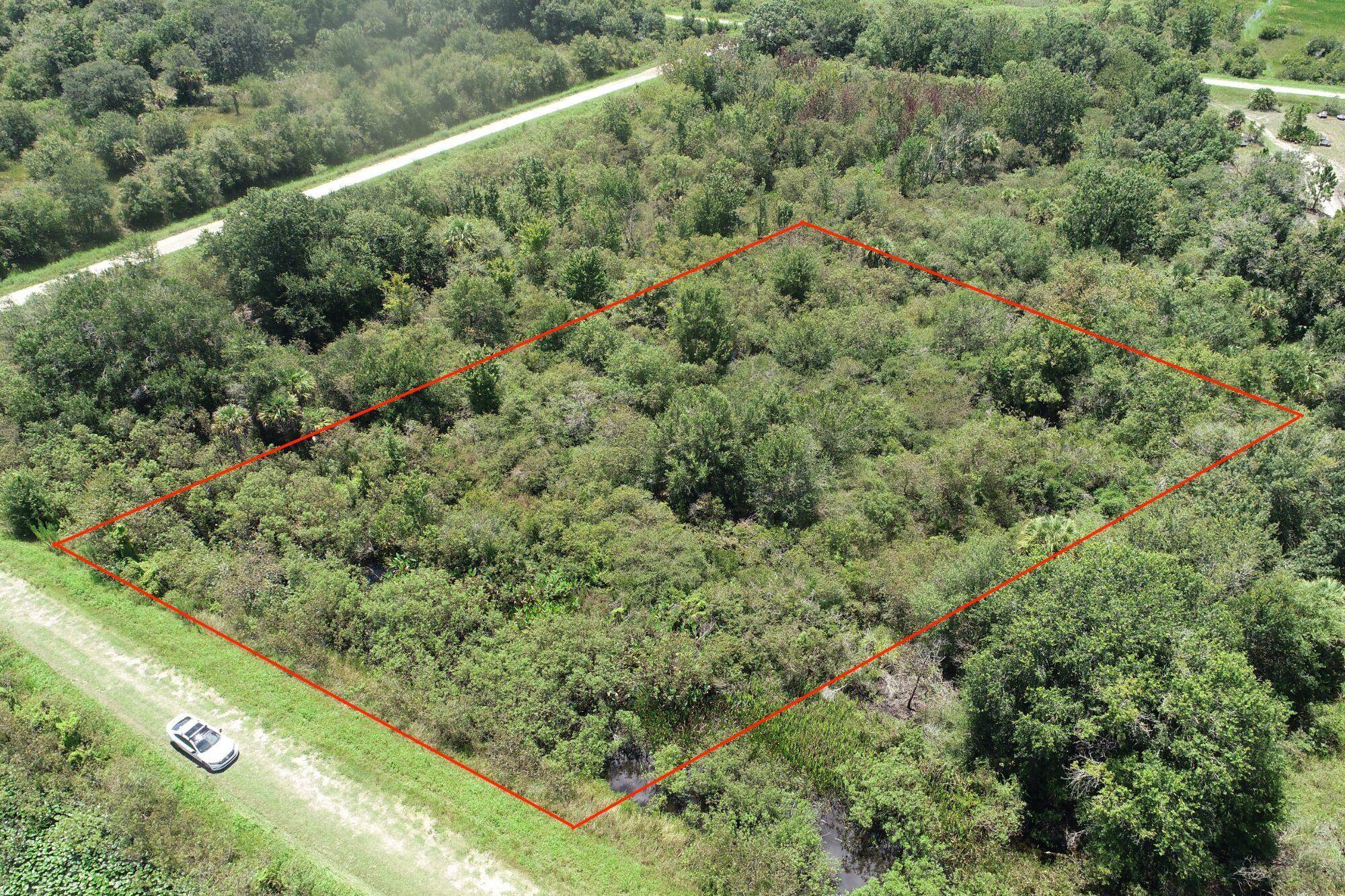 FINANCING AVAILABLE ! ! Build or bring your dream home and barn on this beautiful 1.