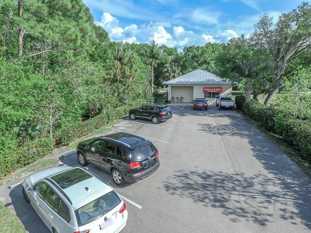 Commercial land and CBS building currently beauty salon spa.