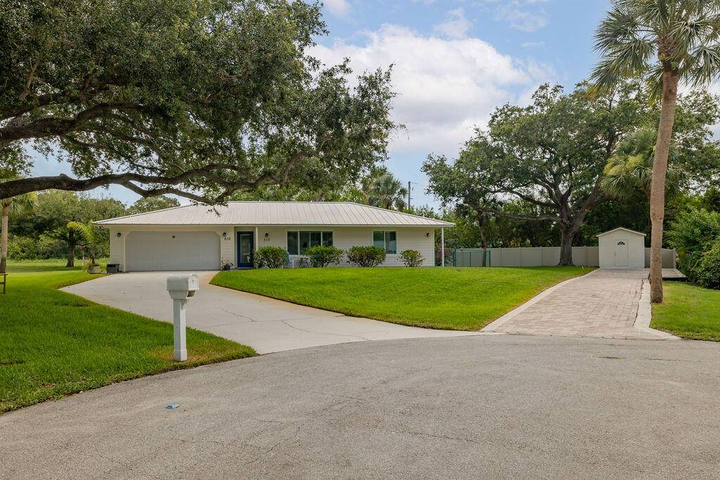 Welcome to your Florida oasis in the desirable Westwood neighborhood off 5th St SW.
