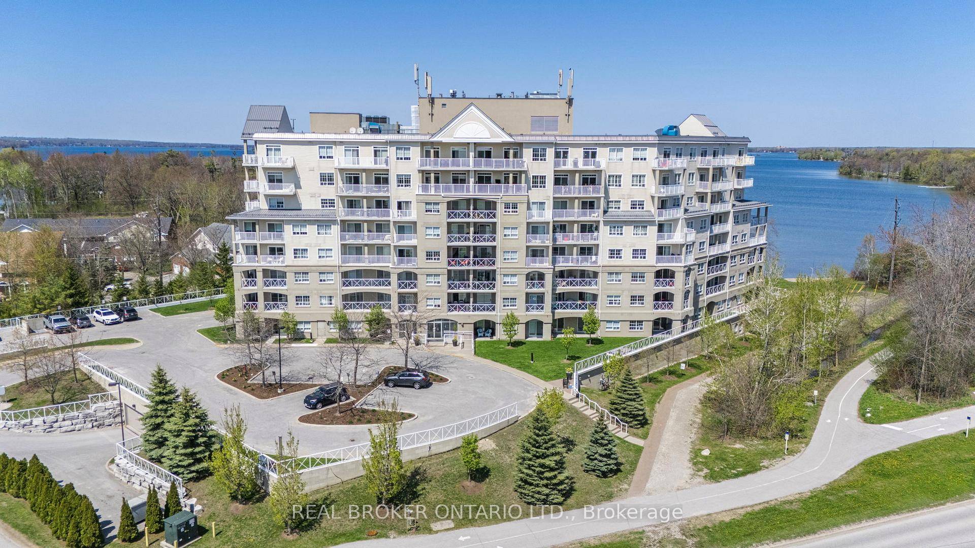 Experience refined waterfront living in this stunning condominium boasting panoramic views of both Lake Couchiching and Lake Simcoe.