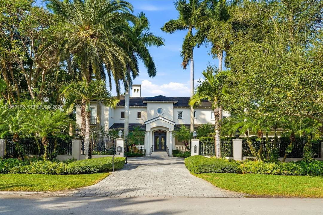 Fantastic gated corner acre estate in Ponce Davis with everything you could want for the active family lifestyle !