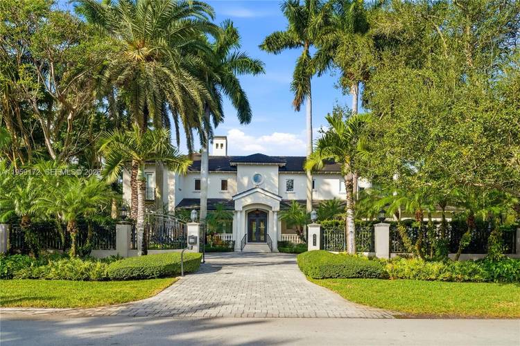 Fantastic gated corner acre estate in Ponce Davis with everything you could want for the active family lifestyle !