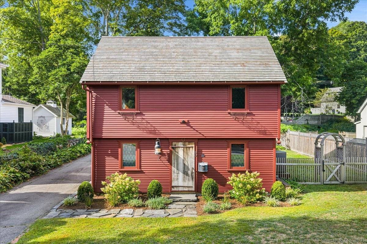 Sweet reproduction Saltbox Colonial in Essex Village.