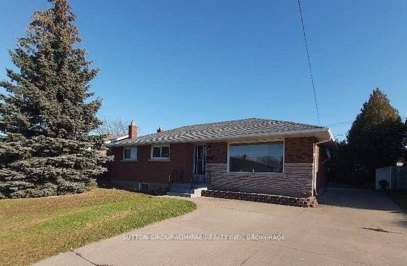 Well Maintain 3 3 bedrooms brick bungalow with double concrete driveway ideal for a large family or 2 families.