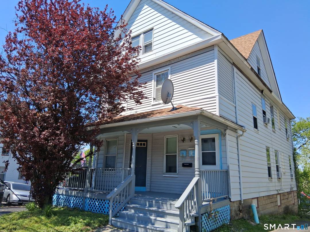 Fantastic 2 family with a finished attic addi, tional kitchen and bath plus bedroom, great for those in need of space or possible 3rd apartment.
