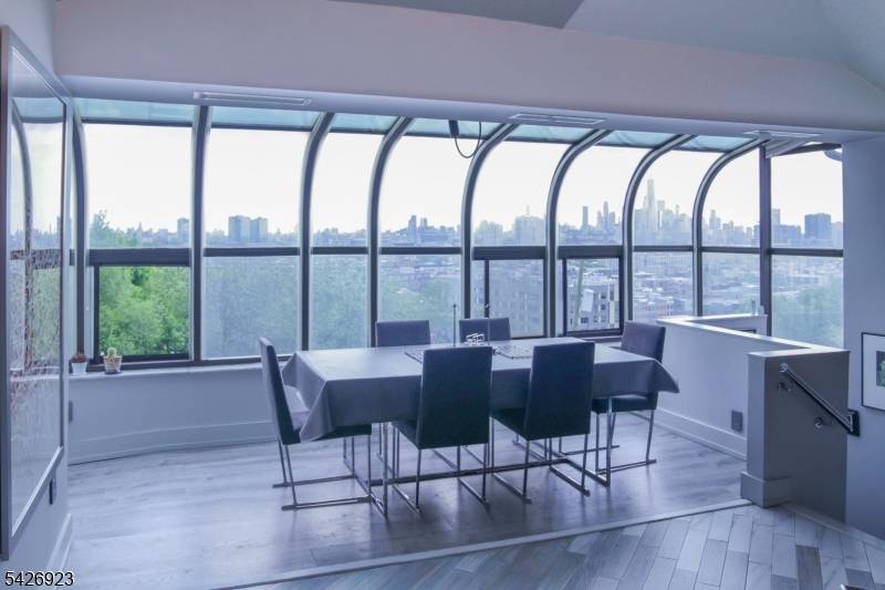 A rare penthouse residence with DIRECT PRIVATE ELEVATOR entry and unobstructed NYC skyline views.