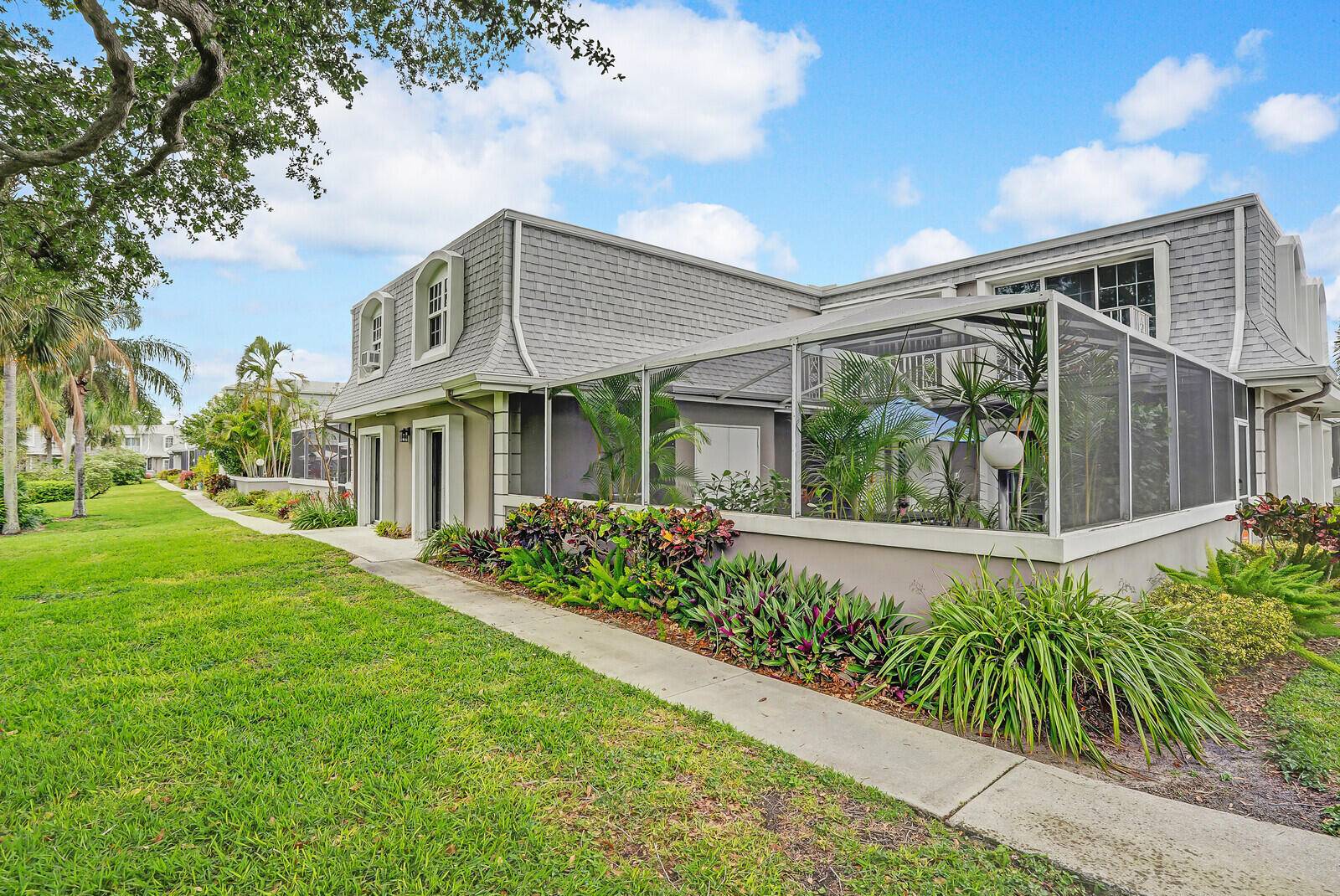 Tucked away in the charming community of Vision One, this private residence has been masterfully renovated from top to bottom !