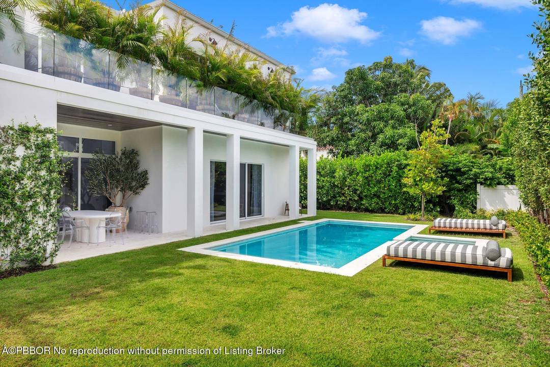 Experience refined modern living in this impeccable new construction home featuring four bedrooms, four and a half bathrooms, a large two car garage, and a resort style pool.