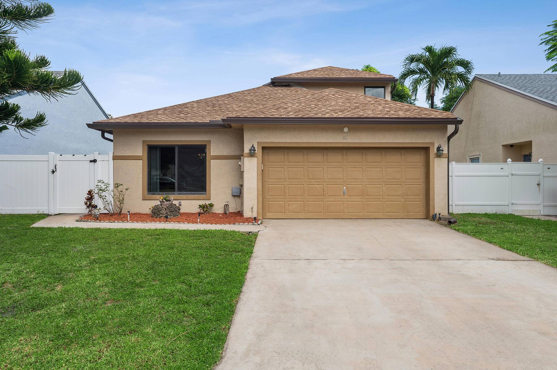 3 2. 5 two story house with a 2 car garage, fenced yard and large sun room !