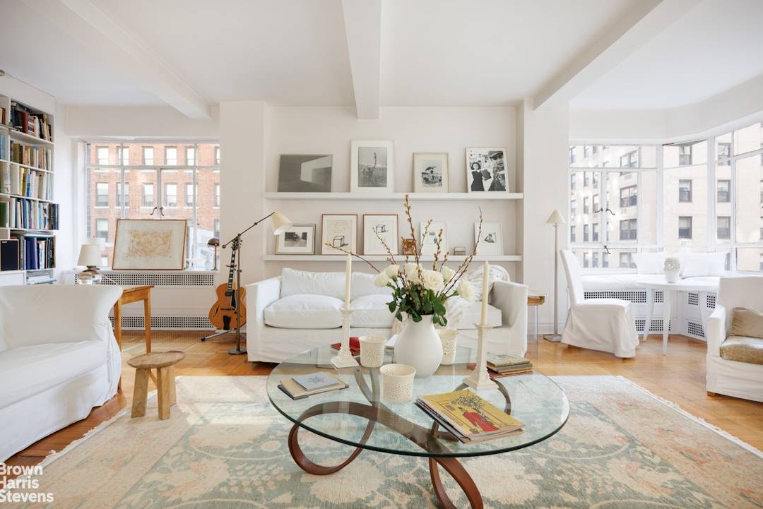 Corner Pre War Residence on Madison Avenue in the heart of Carnegie Hill Providing a wide corner footprint and impressive expanse along Madison Avenue, this vast approximately 3, 000 square ...