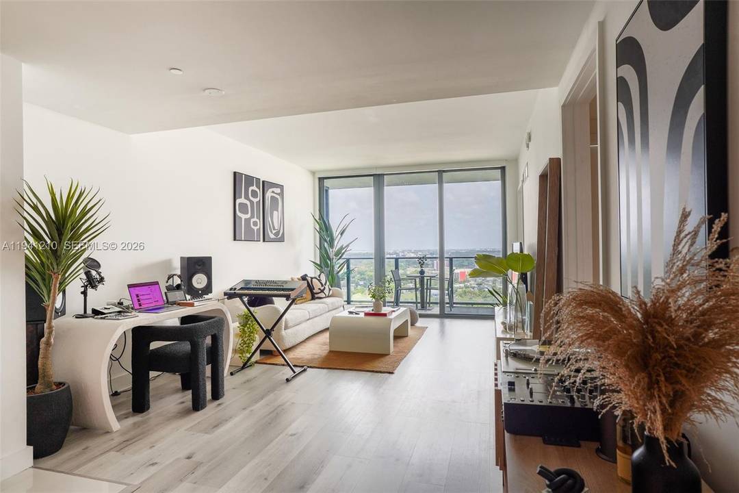 Enjoy stunning city views from this modern 1 bedroom, 1 bath condo on the 27th floor of the prestigious Hyde Midtown.