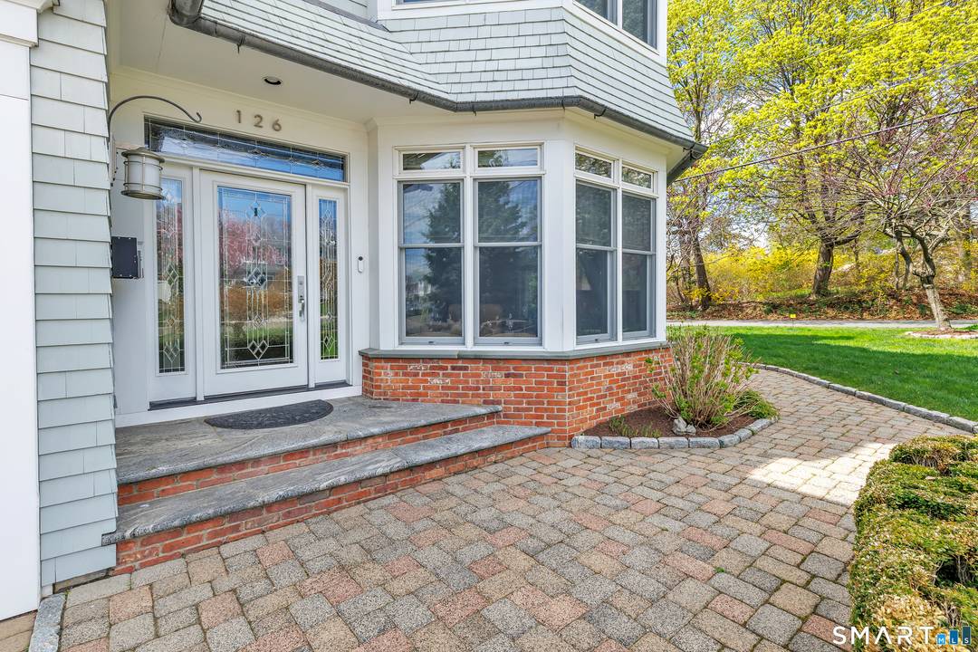 Set within the private Laurel Beach community, this exceptional coastal home offers a refined blend of luxury and lifestyle just steps from the beach.