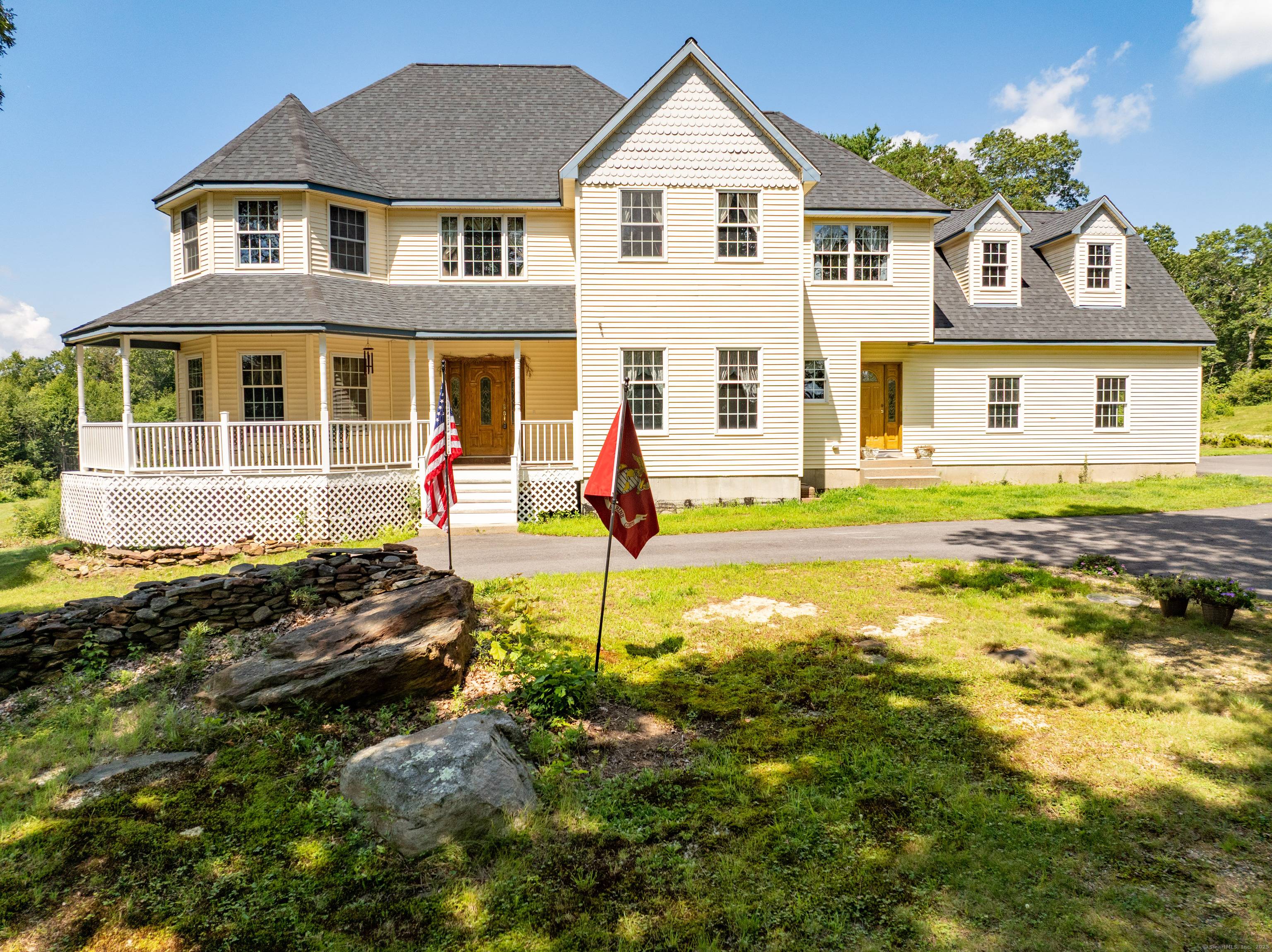 Situated atop a picturesque hill and surrounded by lush, mature trees, this magnificent 3, 628 sq ft Colonial, built in 2001, offers unmatched privacy, panoramic views, and a refreshing natural ...