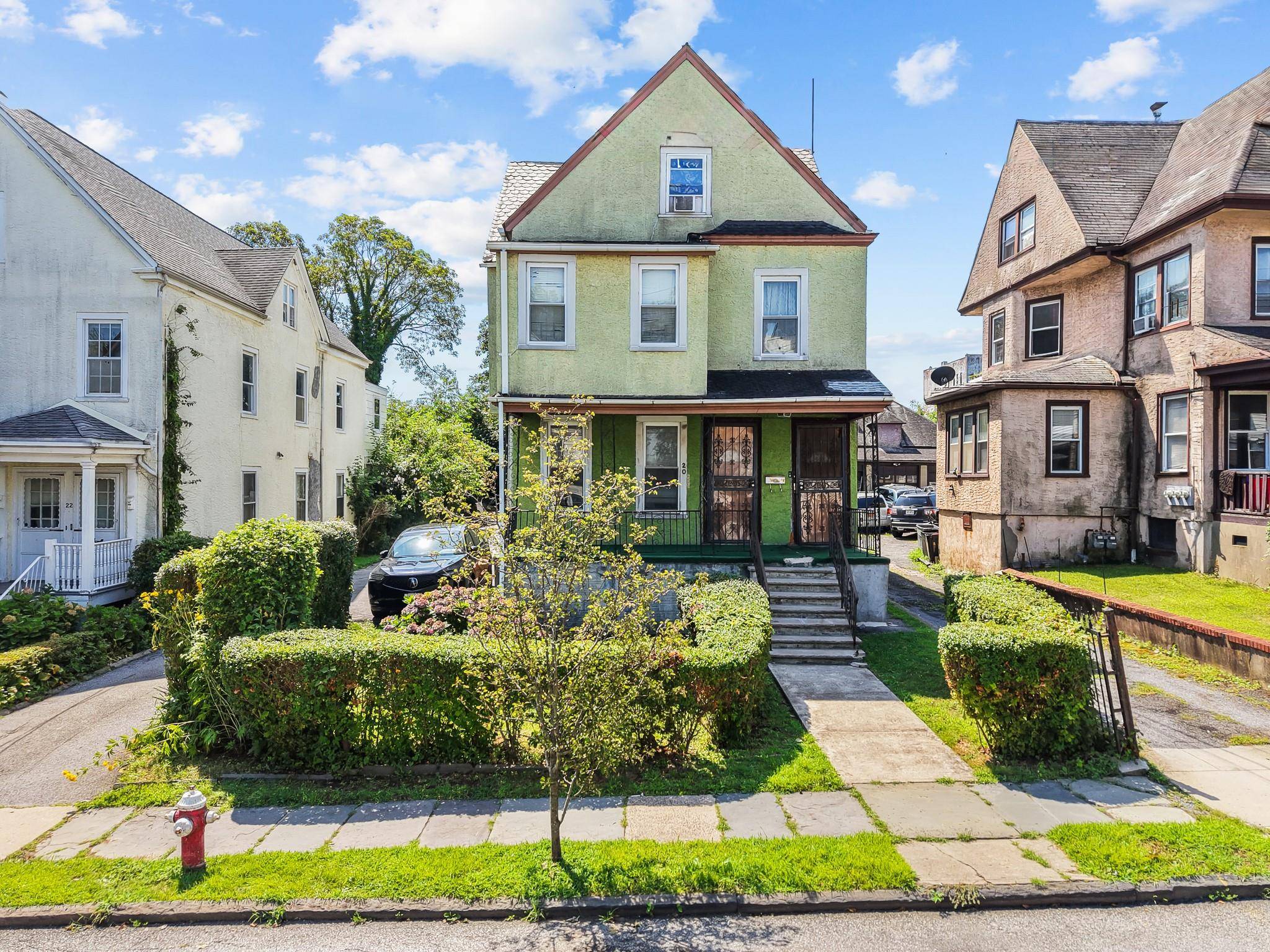 Welcome to 20 Adams Street, a detached 2 family on an oversized 30 x 142 lot on a quiet residential street with a private driveway, detached garage, and covered porch.