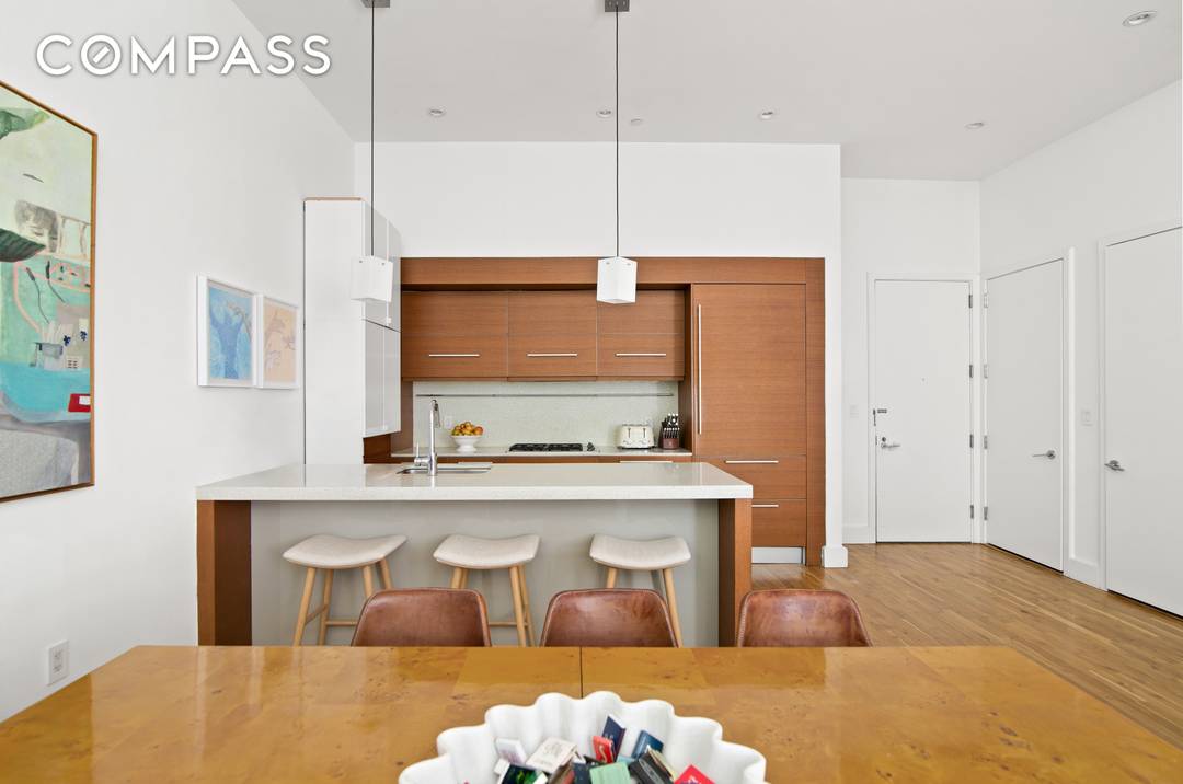 Perfect for entertaining, this stunning 2 Bed 2 Bath residence offers a seamless flow with its expansive open concept living and dining area, enhanced by soaring 13 foot ceilings and ...