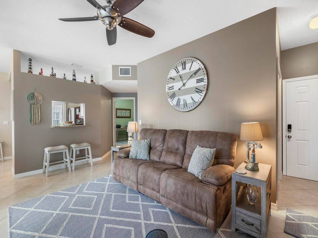 Welcome to this well maintained 3 bedroom, 2 bath condo offering a serene pond view and an ideal location just steps from the clubhouse and community pool.