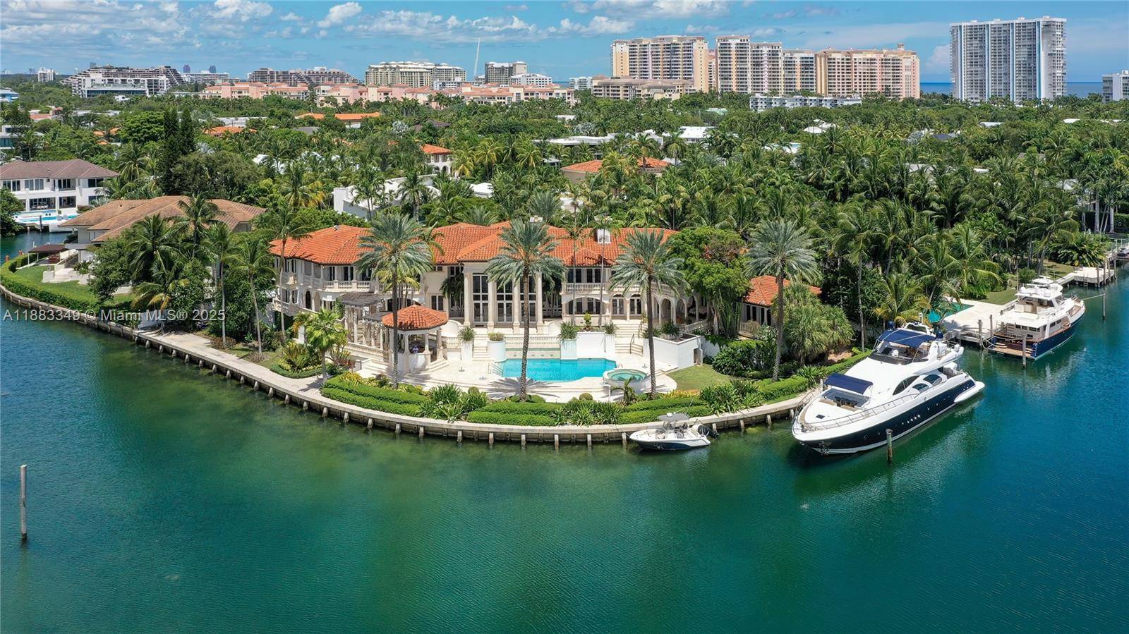 Private and prestigious waterfront estate featuring Panoramic views of Biscayne Bay and Pines canal.