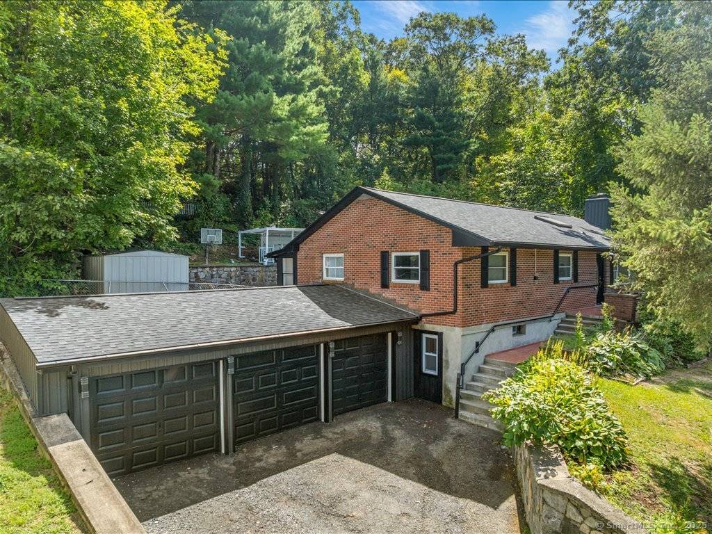 Welcome to your dream home in the heart of Seymour, Connecticut, a fully updated hillside retreat offering modern living, stunning river views, and unmatched versatility.