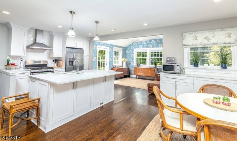 Set on over 4 acres in prestigious Harding, beautifully updated 3 bedroom, 2.