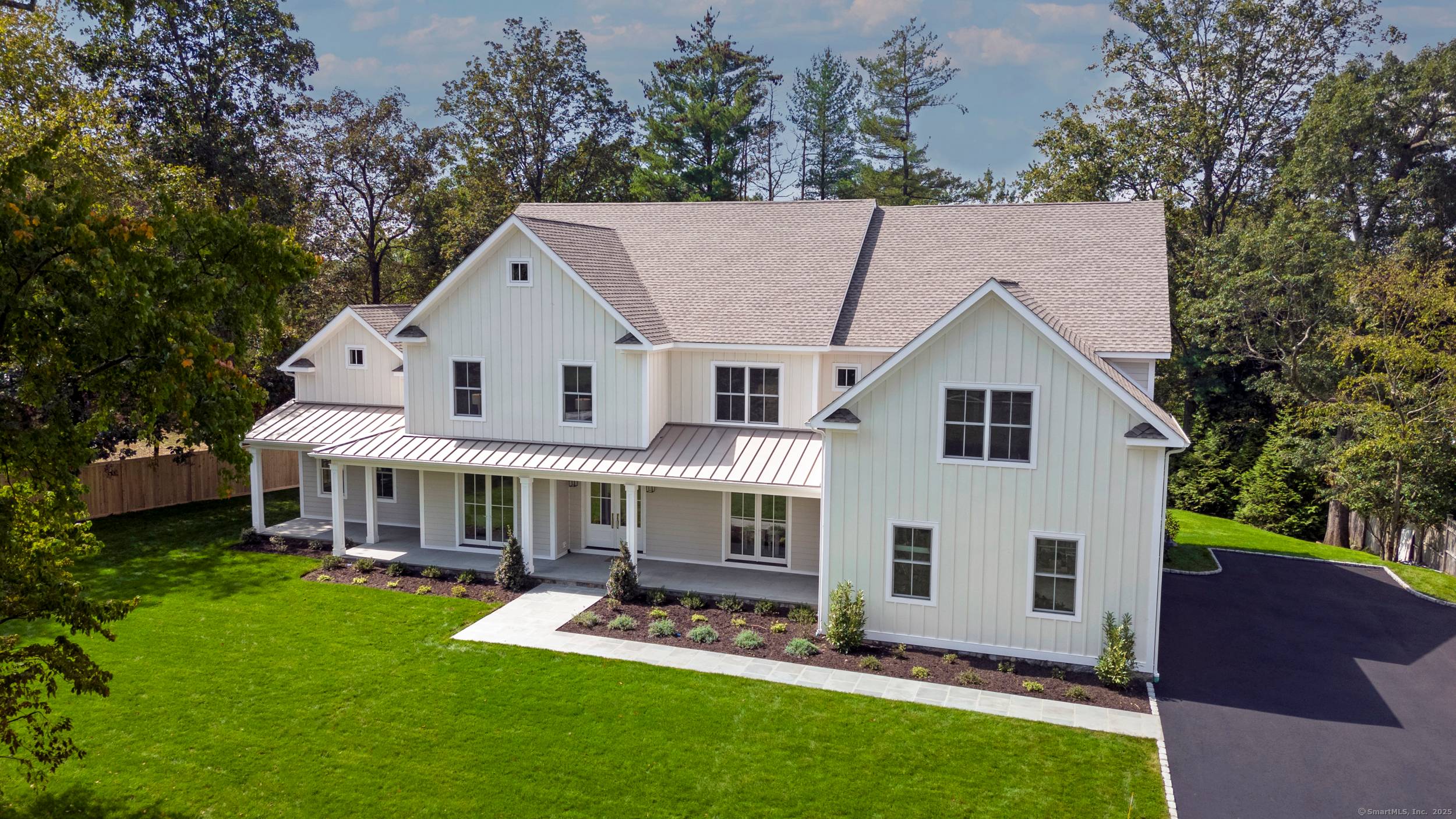 Welcome to 32 Webb Road, a stunning new home nestled on a quiet cul de sac in one of Westport's most desirable neighborhoods.
