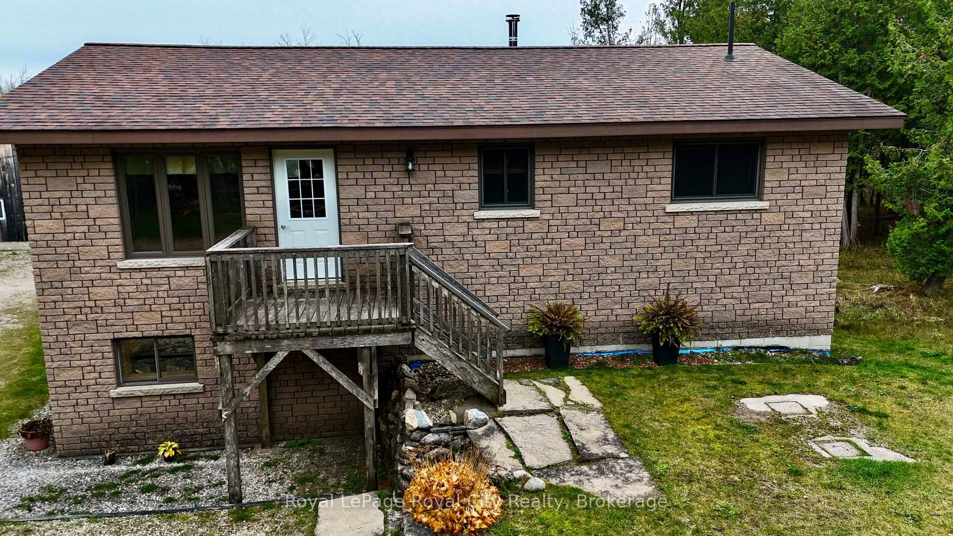 Charming Tobermory Retreat with Massive Heated WorkshopWelcome to 26 Little Cove Road, a beautifully maintained raised bungalow offering privacy, comfort, and incredible potential just minutes from downtown Tobermory !