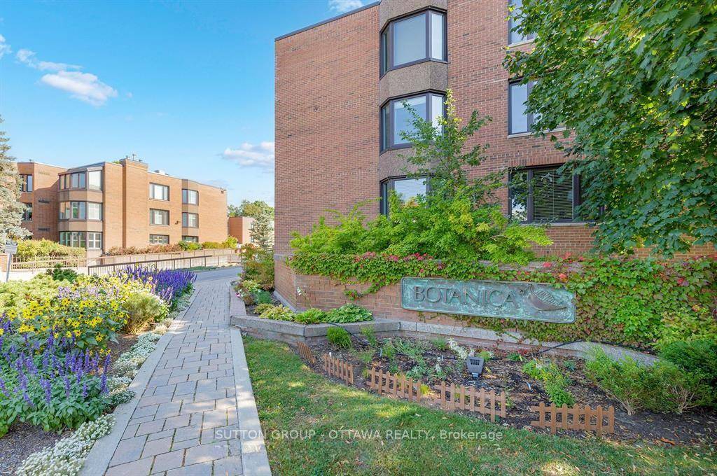 Spacious Condo with Sun Filled Solarium and Lush Green Views.
