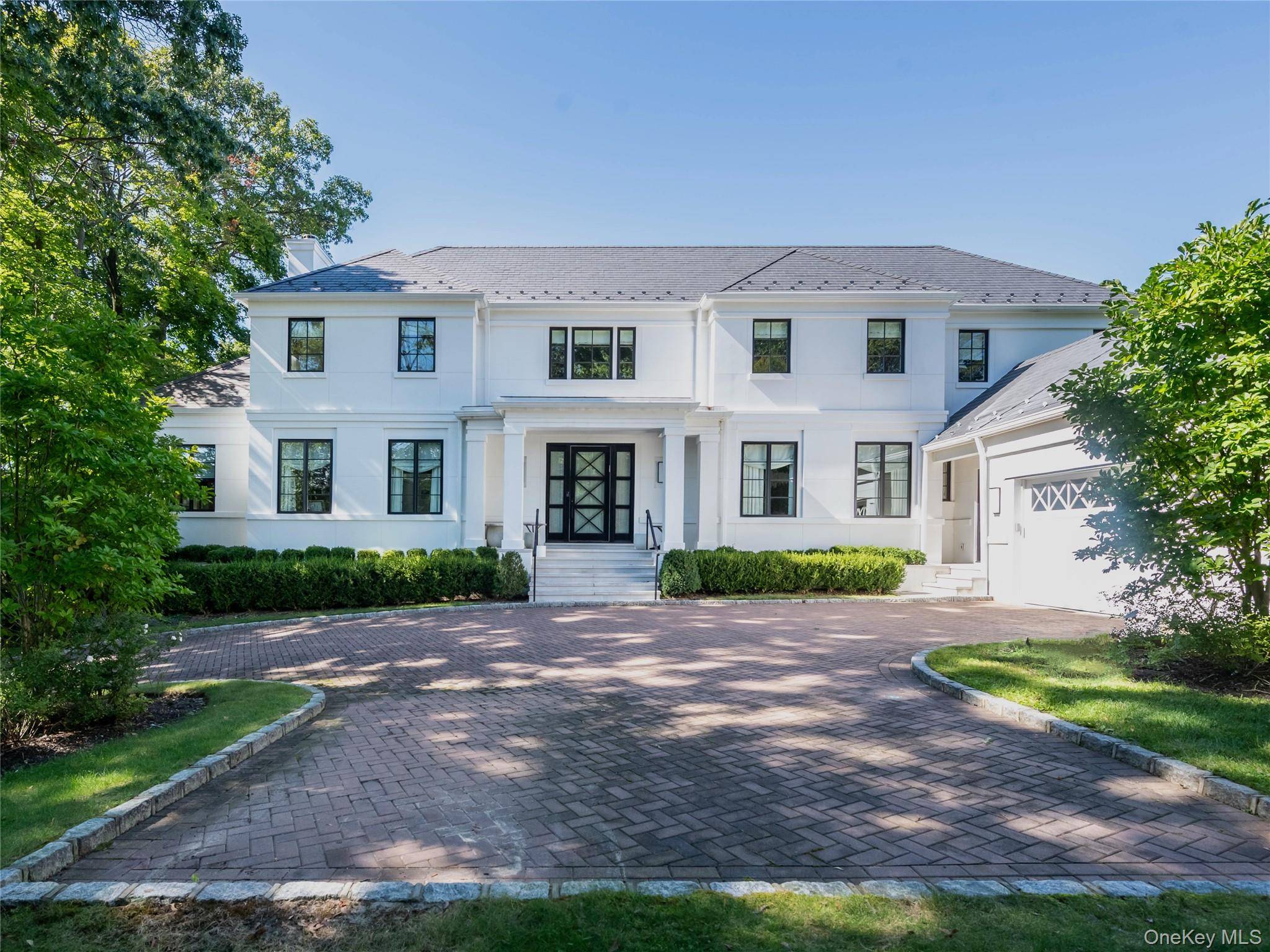 French Modern residence, built in 2018, seamlessly blends contemporary luxury with timeless design.