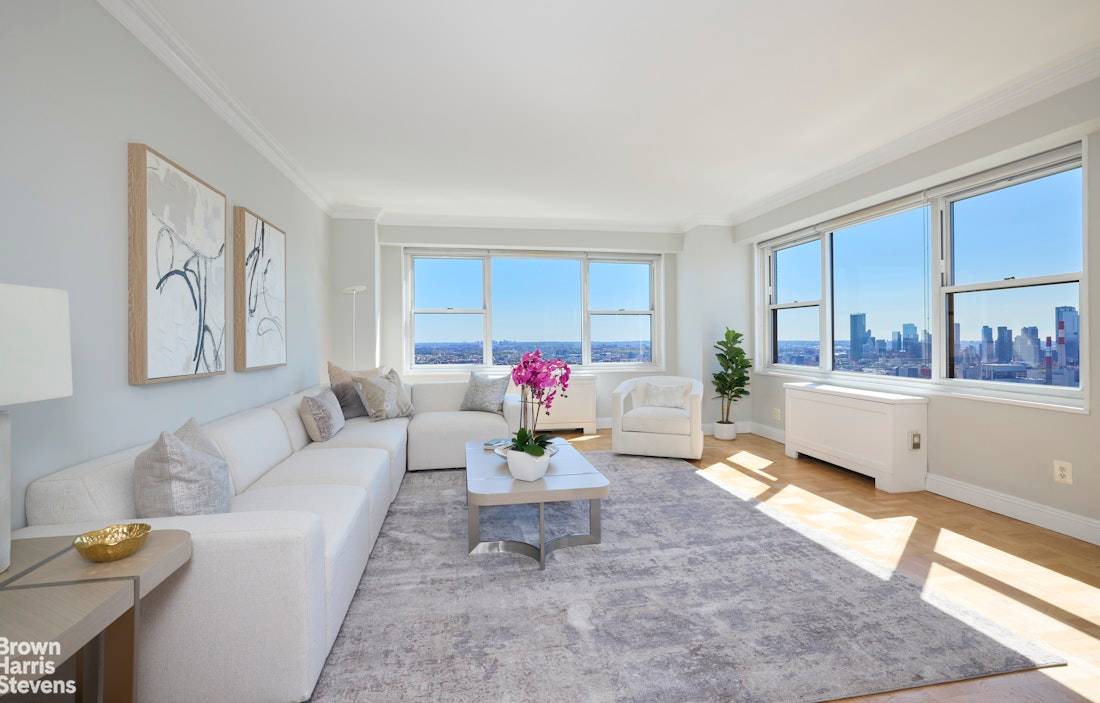 Prepared to be wowed ! Perched on the forty first floor, this two bedroom two and a half bathroom home has sweeping River and City views.