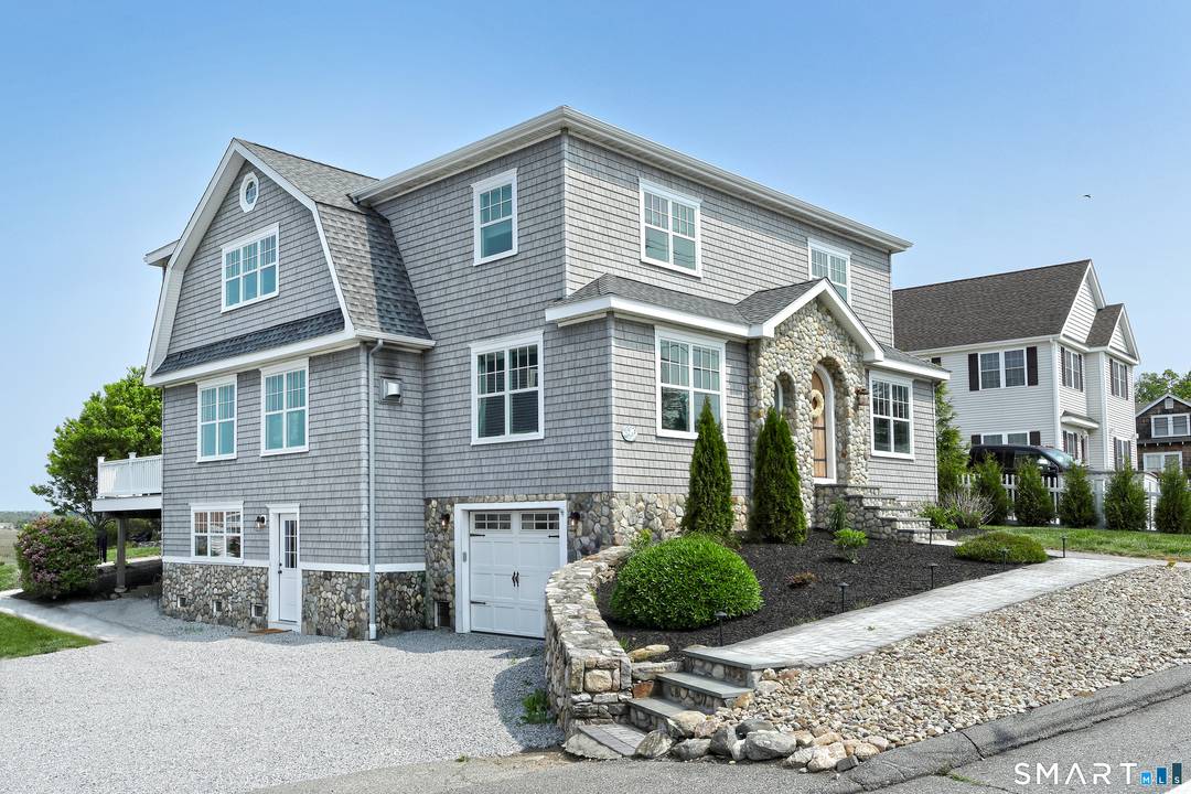 Enjoy coastal living at its finest in the coveted Cornfield Point community.