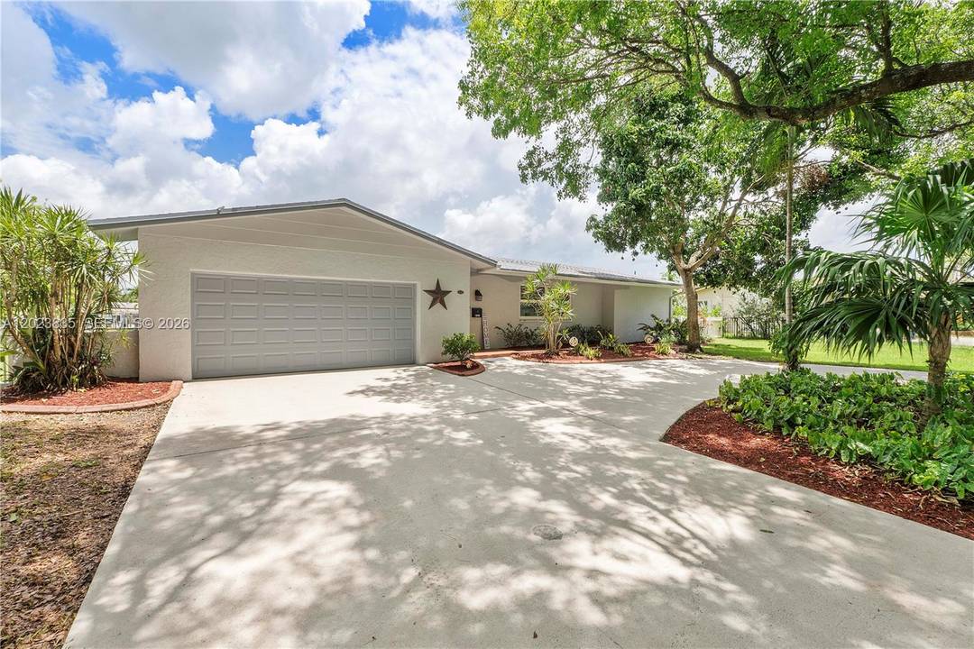 This is the one ! Stunning true 4 bedroom, 2 bath waterfront pool home with ocean access.