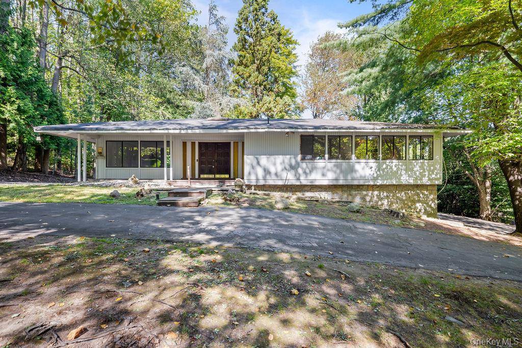 Welcome to 16 Wagon Wheel Drive a sprawling ranch style home brimming with space, sunlight, and potential in the heart of New City !