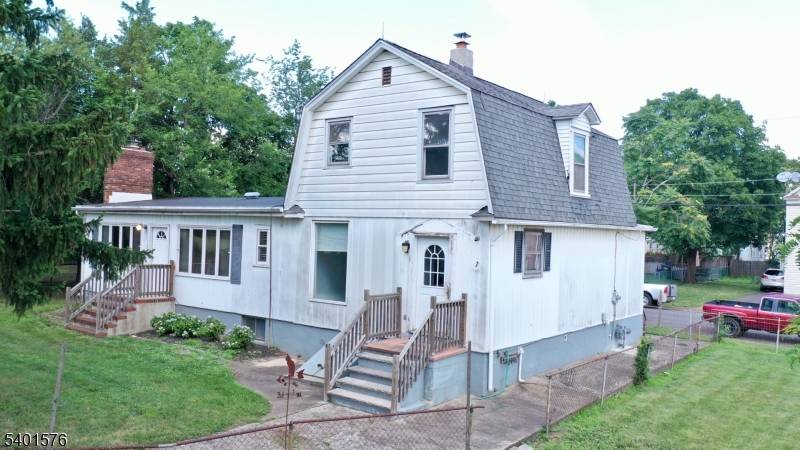 This is a unique 2 family property w a 2 bedroom first floor apartment and a studio apartment on the second floor on a large lot containg a heated 1, ...