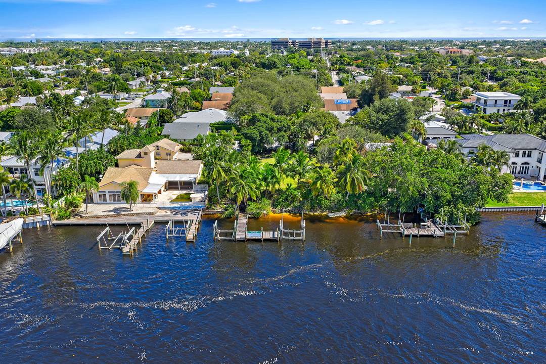 Positioned at the end of a quiet, mature oak tree lined, cul de sac street, West of Ellison Wilson Road and North of PGA Blvd.