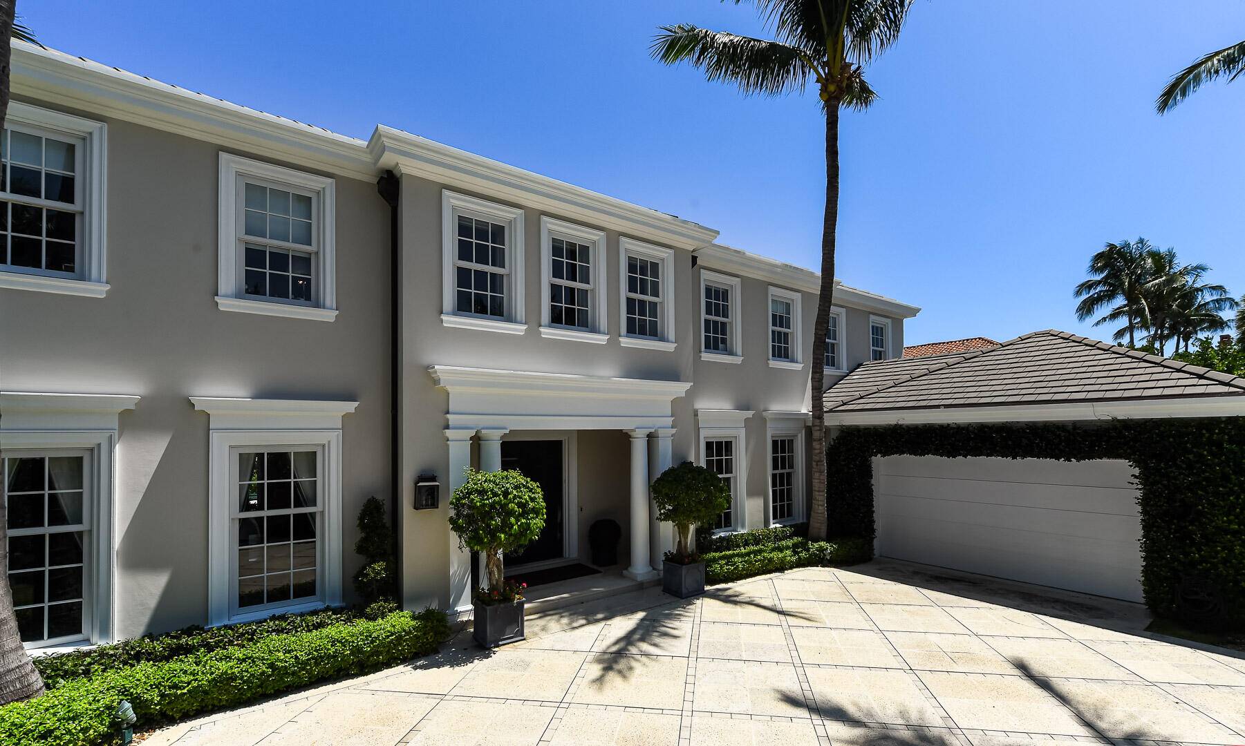 Beautiful 5BR 6. 3BA Traditional Georgian style home located in Palm Beach's acclaimed Estate Section.