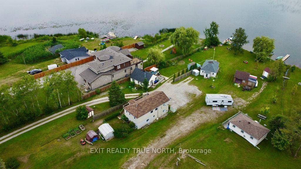 Excellent waterfront opportunity in Springwater across the road from Orr Lake Golf Club !