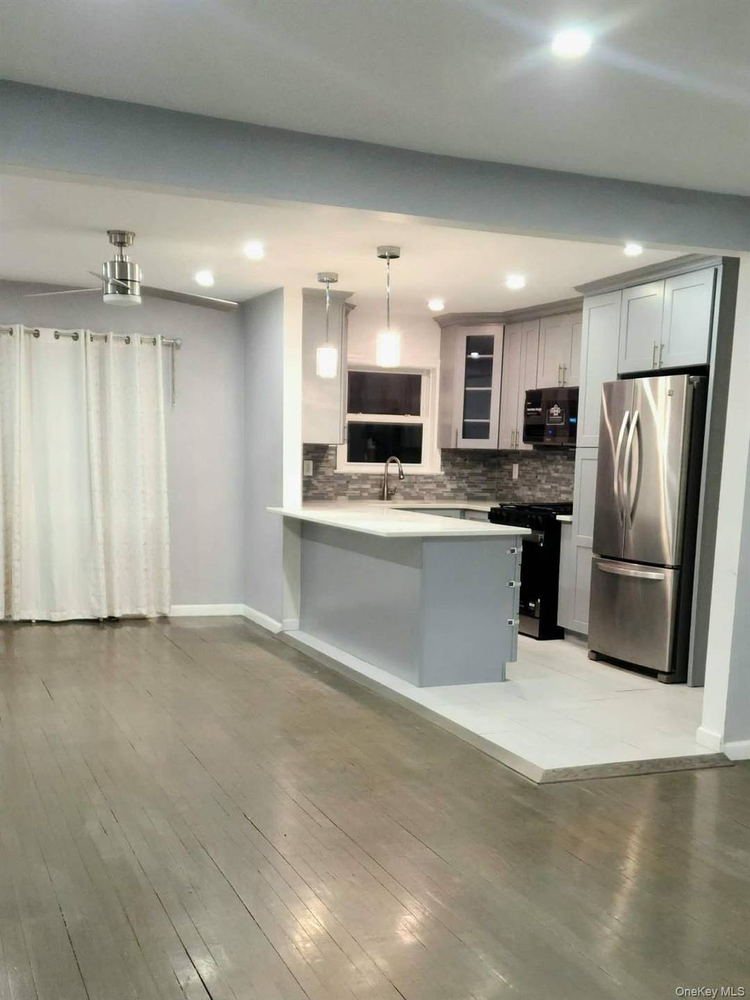 Introducing a sophisticated and move in ready single family residence perfectly positioned in the heart of Queens Village.