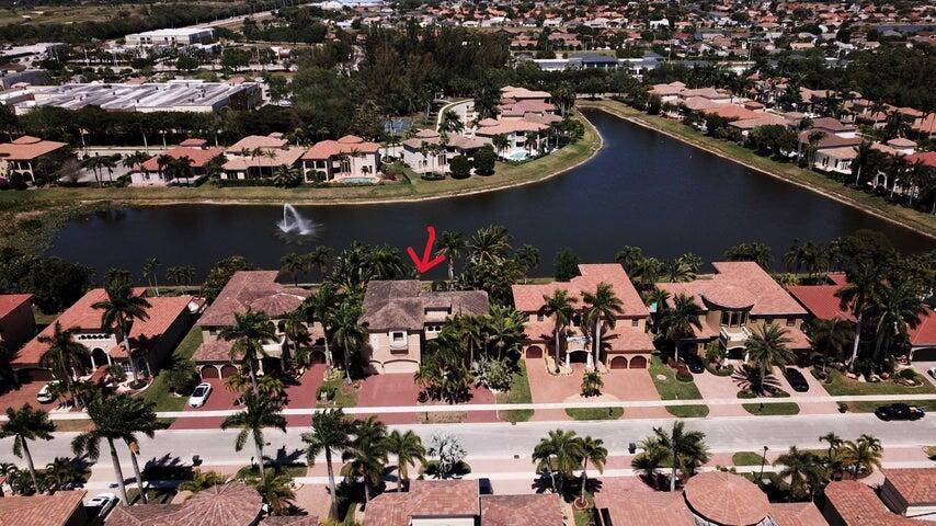 Nestled in a small luxurious community, just inches away from the Wellington border, amp ; minutes away from the turnpike, A rated schools, oversized, glamorous amp ; unique water front ...