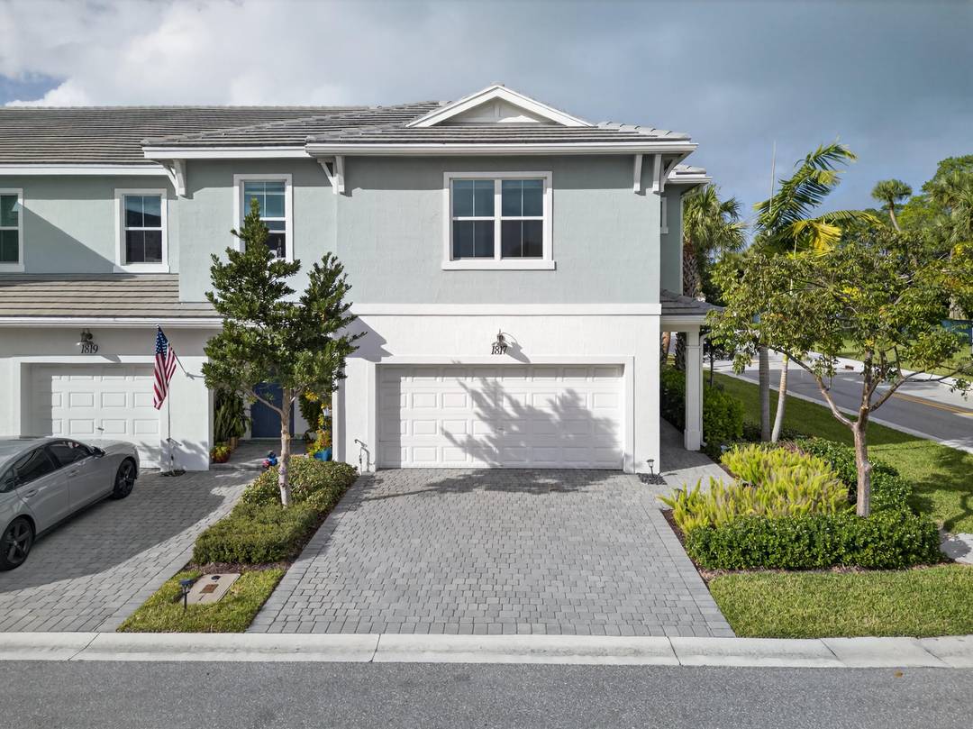 Located in the gated community of Sandpiper Pointe, this 2 story luxury townhome built in 2023 offers 3 bedrooms plus a spacious loft, 2.