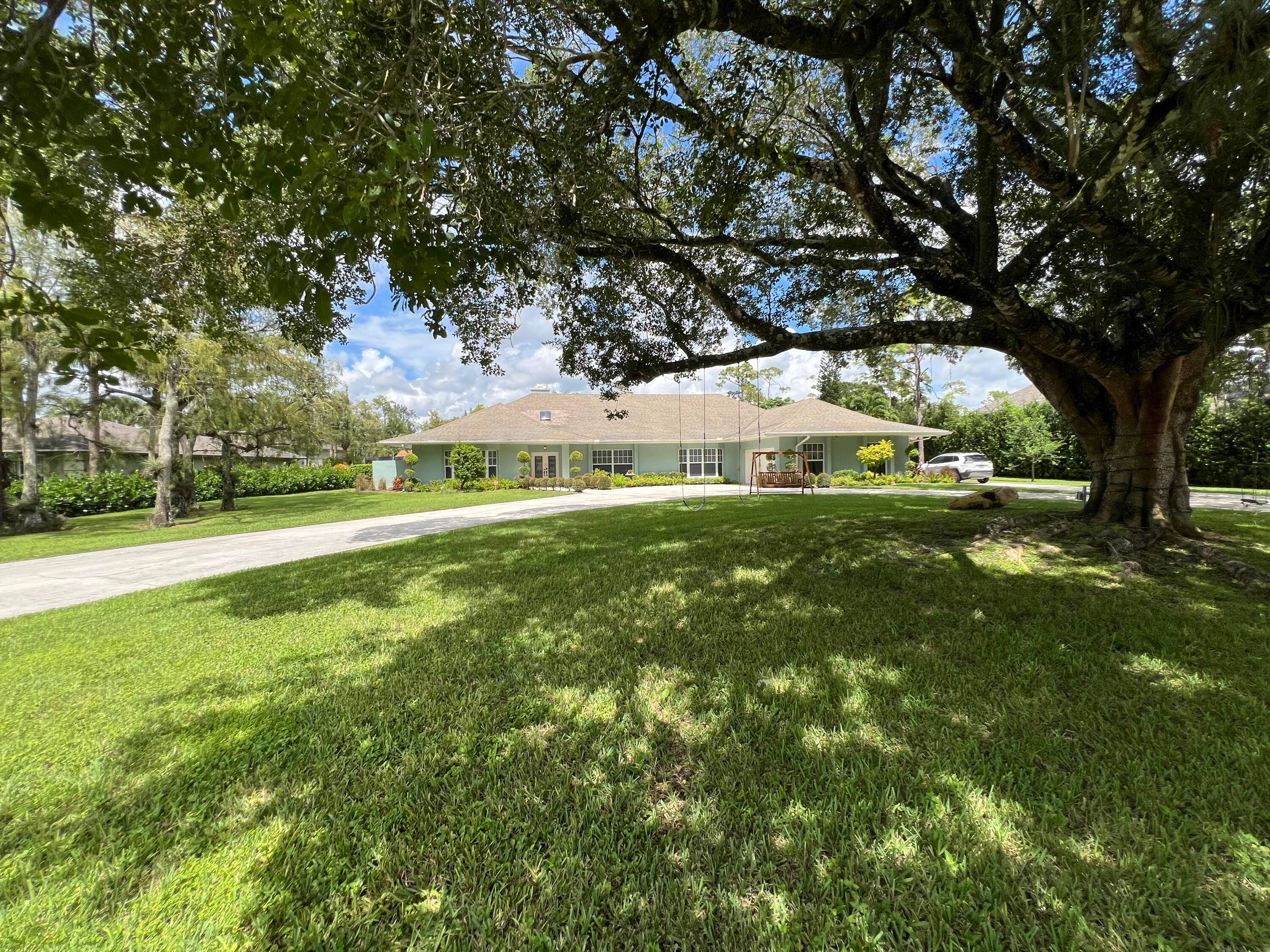 The Ultimate Seasonal Rental Discover a true paradise retreat in this beautifully renovated 4 bedroom, 4 bathroom home with an additional office, set on a full acre of land.