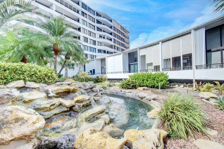NOW IS THE TIME TO BUY. UNIT ACROSS STREET FROM BEAUTIFUL BEACH.