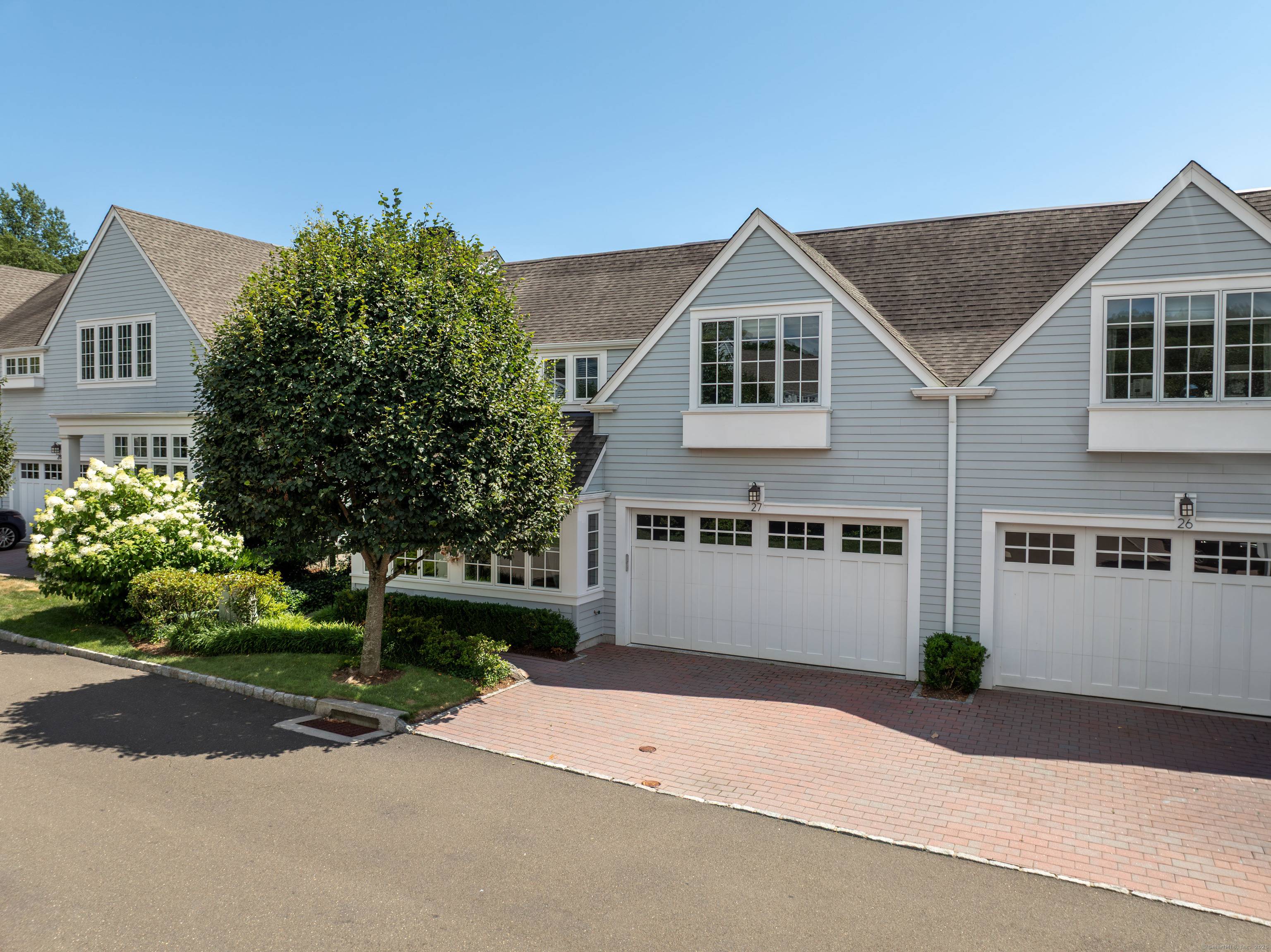 Nestled in one of Kensett's most coveted locations, this stunning Norwood townhome backs to serene conservation land and blends refined luxury with modern comfort.