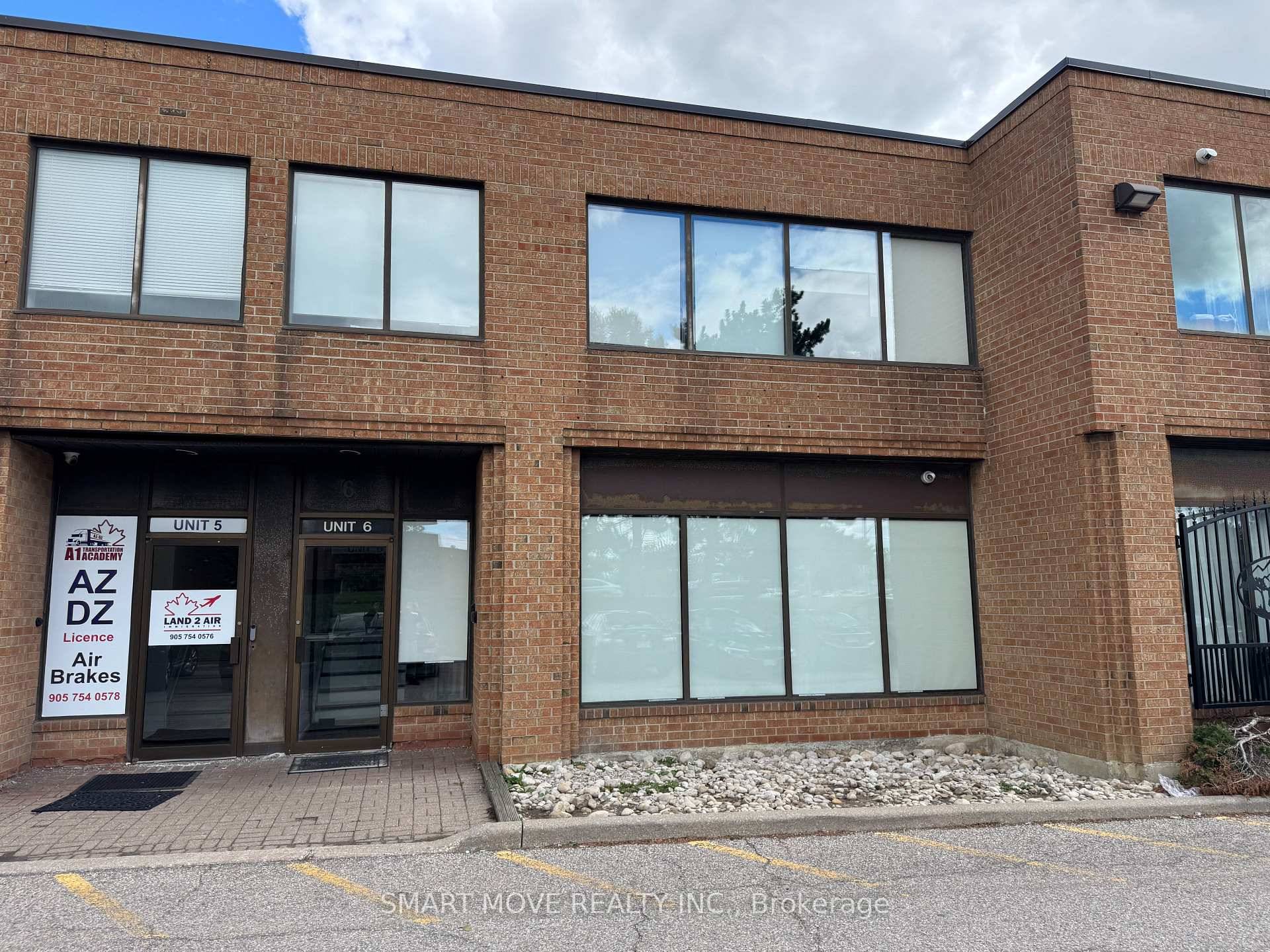 Great opportunity, newly built main floor office with drive in warehouse at the back.