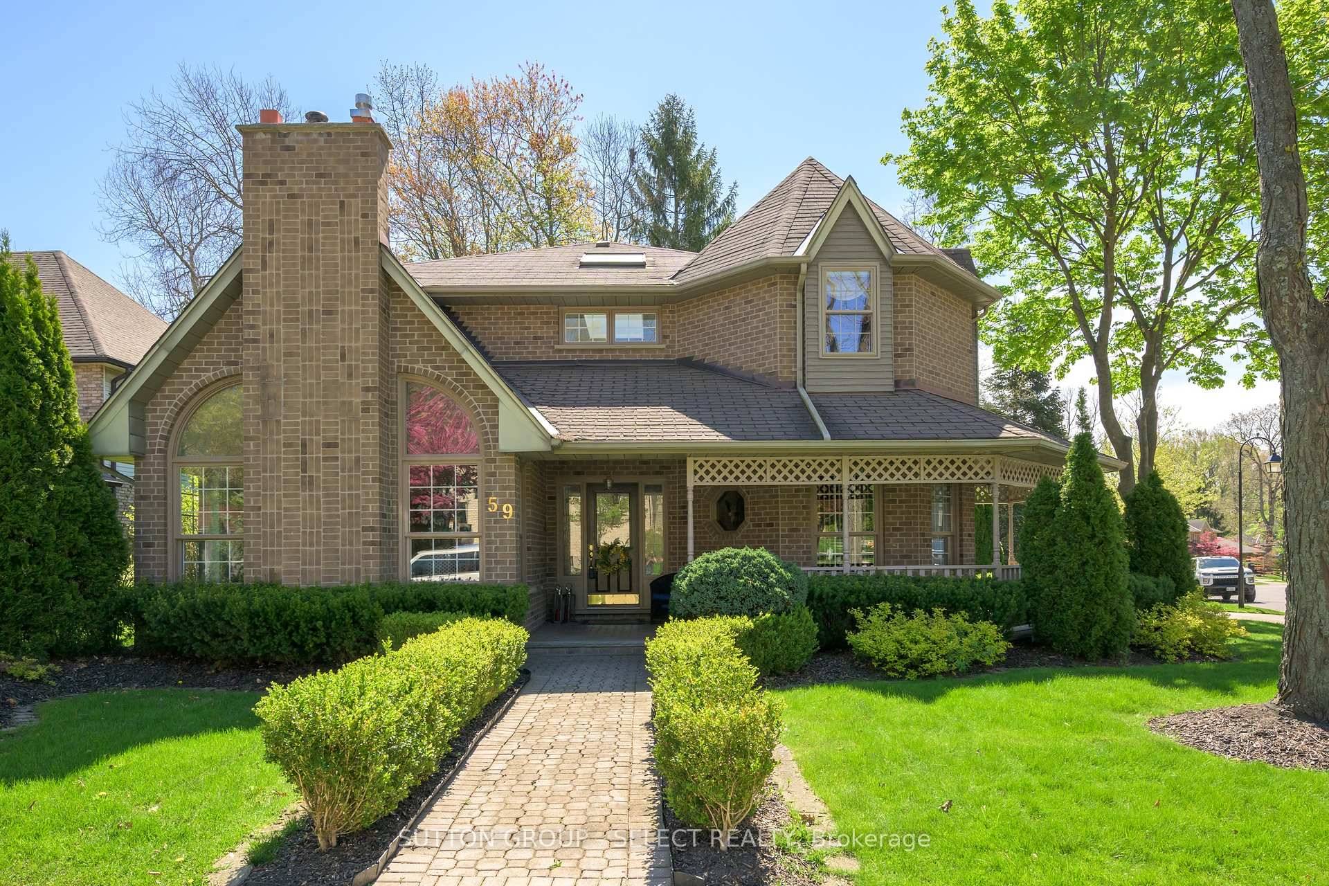 This absolutely charming, one of a kind, custom built model home shines in the distinguished Warbler Woods community.
